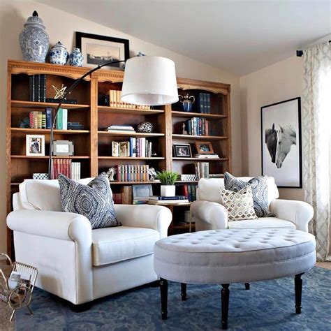 Who wouldn't want to spend an evening reading and relaxing in this cozy library design by ...