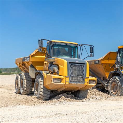 Comparing All Articulated Dump Truck Brands: Who's The Best? | DOZR