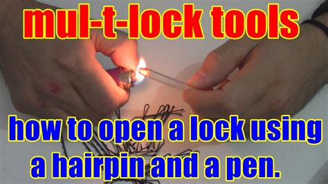 how to open a lock using a hairpin and a pen. mul-t-lock tools locksmith - YouTube