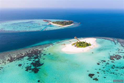 - Drone view of a tropical island, Maldives | Royalty Free Image