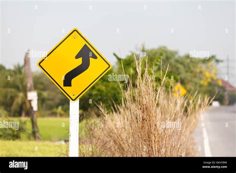 winding road sign Stock Photo - Alamy