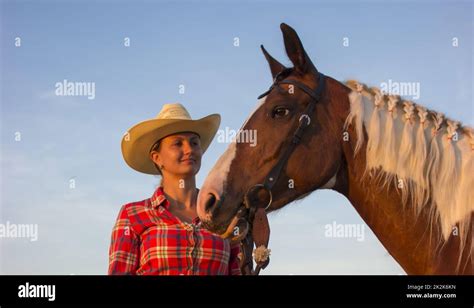 Western girl with her horse Stock Photo - Alamy