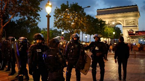 France riots: Heavy police presence at Champs-Elysees in protest ...