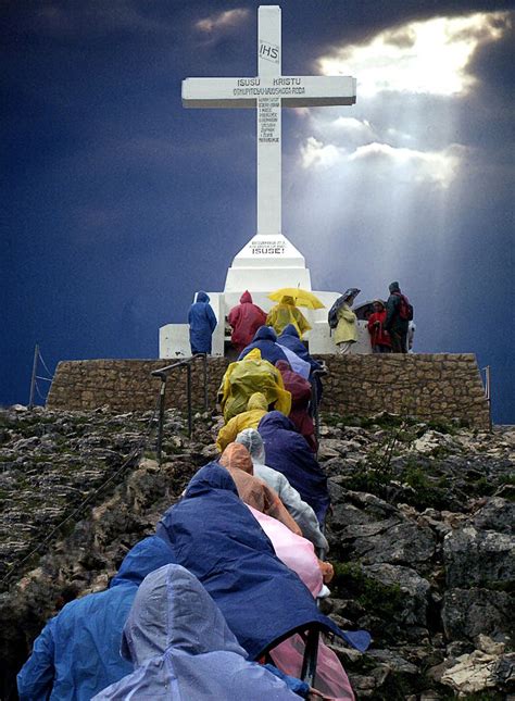 Pilgrims at Krizevac hill, Medjugorje, western Bosnia & Herzegovina. A ...