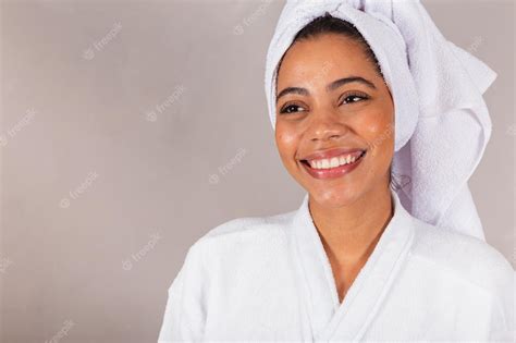 Premium Photo | Beautiful brazilian black woman wearing bathrobe and towel closeup photo smiling ...