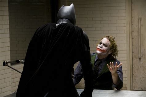 32 on-set photos of Christian Bale and Heath Ledger during the interrogation scene from THE DARK ...