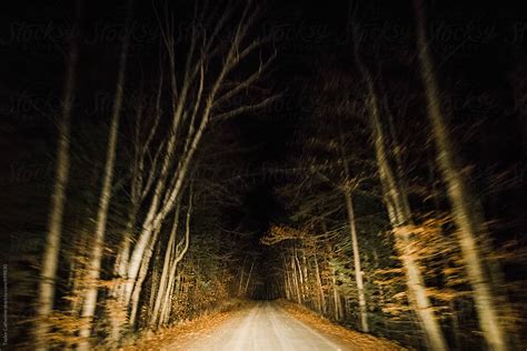 "Spooky Road At Night" by Stocksy Contributor "Itla" - Stocksy