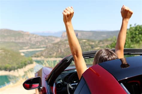 Happy Woman in a Convertible Car Raising Arms Stock Photo - Image of ...