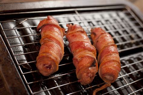Free Stock Photo 17252 Close up of cooked pigs in blankets on oven tray ...