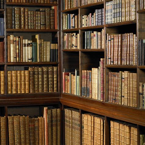 Shelves Of Old Books In Library Photograph by Dougal Waters - Pixels