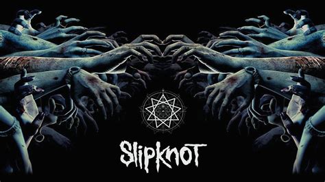 Download A Dramatic Representation Of Slipknot Band Logo Wallpaper | Wallpapers.com