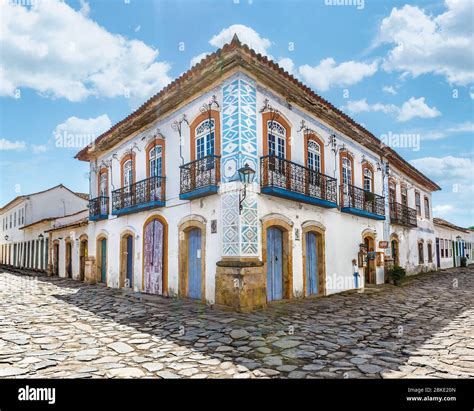 Street and old portuguese colonial houses in historic downtown in ...