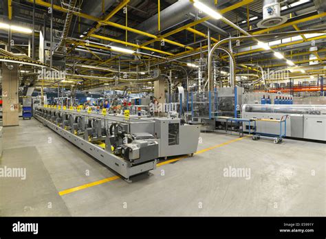 Modern industrial machines in a printing shop Stock Photo - Alamy