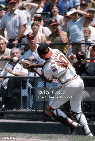 Elrod Hendricks of the Baltimore Orioles can't catch this foul pop-up ...