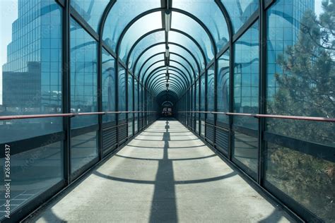 Abstract industrial outdoor covered walkway glass tunnel. Pedestrian ...