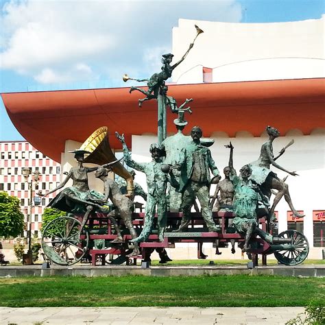 Monument in front of the „Ion Luca Caragiale” National Theater in ...