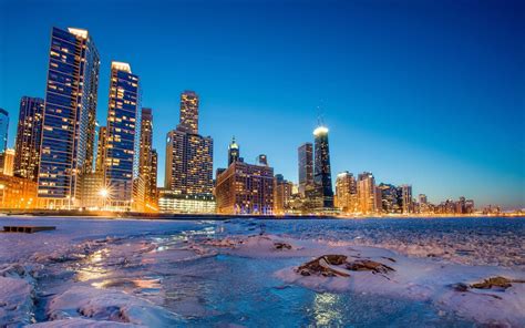 Chicago lakeshore at night, in winter: Frozen Lake Michigan, skyline ...