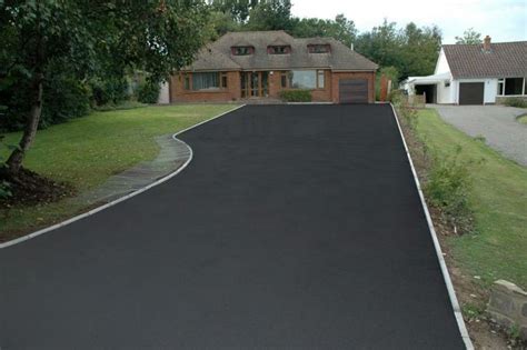 Black Stained Concrete Driveway