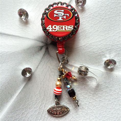 San Francisco 49ers Badge Reel with beads and charms all made with beautiful Swarovski Crystals ...