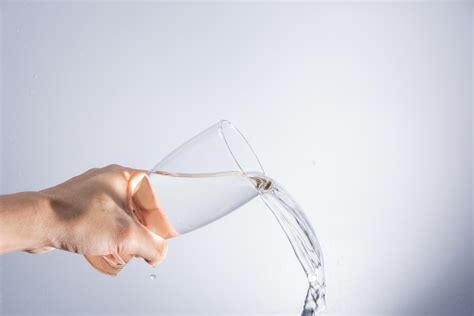 Pouring water out of the glass 1896394 Stock Photo at Vecteezy