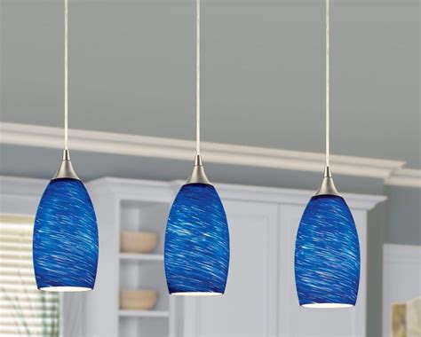 This 3-light pendant light is adjustable and offers an easy way to customize your lighting ...