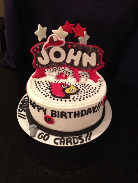 a birthday cake with the name john on it and an angry bird decoration ...