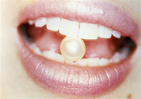 Pearl Between Teeth Photograph by Cristina Pedrazzini - Fine Art America