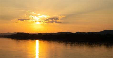 Sunset on the mekong river 2778346 Stock Photo at Vecteezy