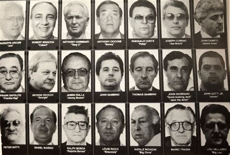 an old black and white photo of men with glasses on their faces, from the early 20th century