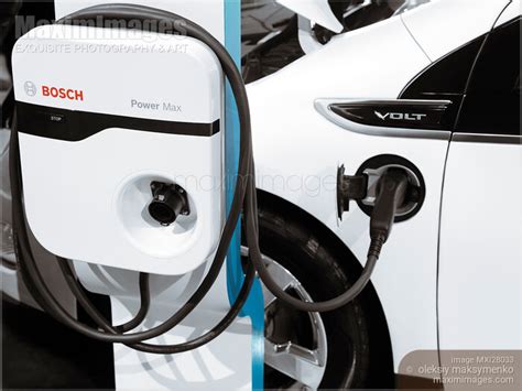 Photo of Chevrolet Volt hybrid electric car charging station | Stock ...