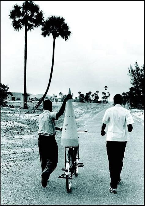 An Indian Space Research Organization (ISRO) Scientist transporting a ...