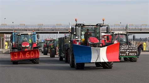 French farmers blockade Paris in heated protest