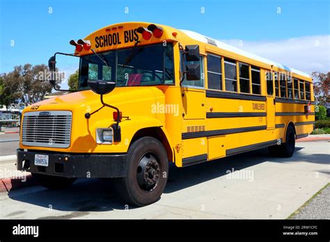 Los Angeles, California: School Bus parked on the street Stock Photo ...