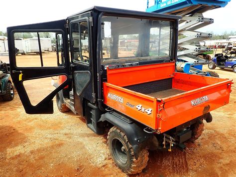 KUBOTA RTV1140 UTV, - 4X4, DIESEL ENGINE, CAB, A/C - J.M. Wood Auction Company, Inc.