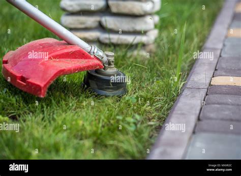 Manual hand grass cutter hi-res stock photography and images - Alamy