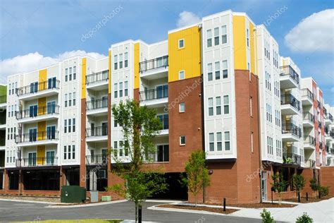 Modern apartment building with parking garage — Stock Photo ...