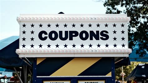 A sign that says coupons on it photo – Free Daydream Image on Unsplash