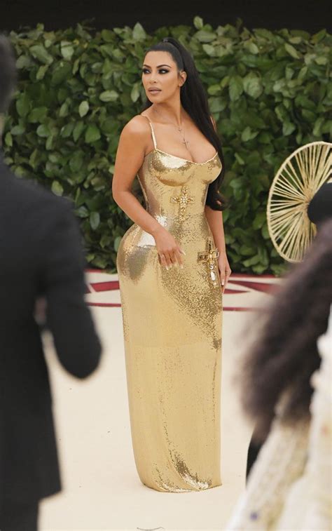 Kim Kardashian Wears Shiny Gold Dress to the Met Gala - Kanye Skips Met Ball