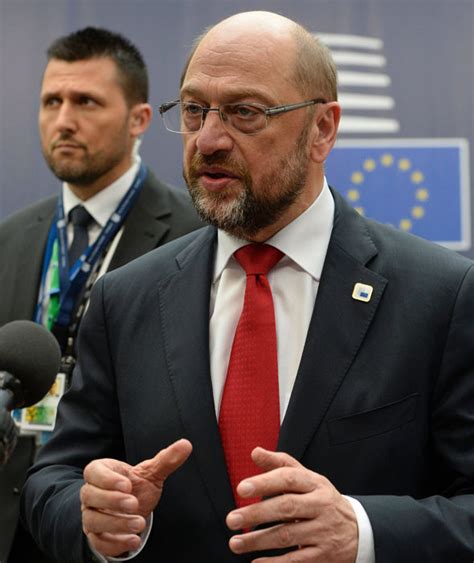 European Parliament President Martin Schulz addresses journalists as he arrives for an European ...