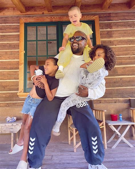 Kim Kardashian shares photo of Kanye West smiling with their daughters as the pair continue to ...