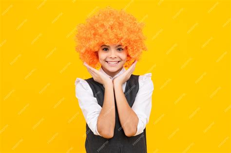 Premium Photo | Funny kid with curly hair wig cute little girl with ...