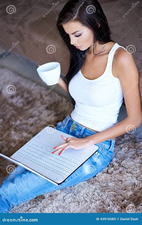 Woman Relaxing with Coffee and Her Laptop Stock Image - Image of interior, hair: 43916585