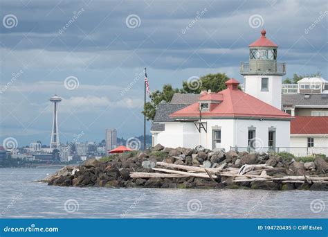 Alki Point Lighthouse and Space Needle on Cloudy Day Editorial Image - Image of sound, building ...