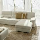 Modern Western Living Room with Beige Leather Sofa and Brown Rugs - Interior Design Ideas