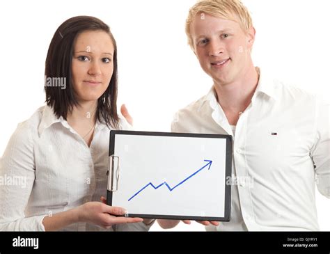 young businesspeople presenting chart closeup Stock Photo - Alamy