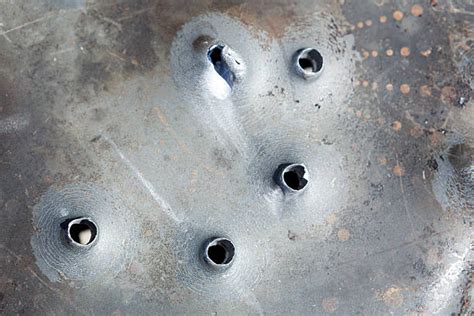 Bullet Hole Metal Stock Photos, Pictures & Royalty-Free Images - iStock