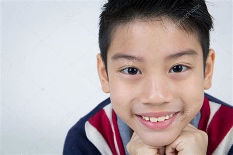 Little asian boy with smile face — Stock Photo © sirikornt #76537143