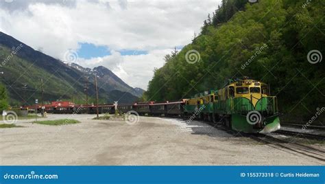 Skagway Alaska Train and Mountains Editorial Stock Photo - Image of ...