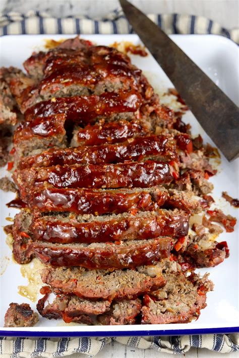 BBQ Meatloaf is stuffed with sautéd peppers, onions and garlic and ...