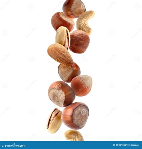 Falling Nuts on White Background Stock Image - Image of energy ...